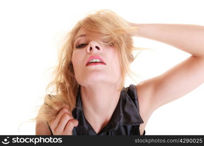 Sexy attractive woman blonde girl in elegant black dress pulling her messy hair isolated on white.