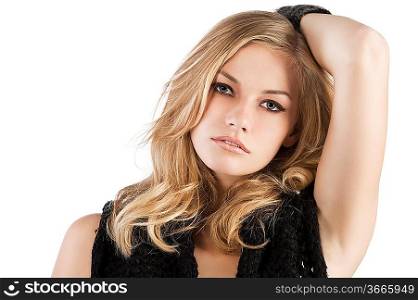 sexy blond girl in topless wearing a black wool scarf around her neck and covering her body like a skirt. she looks in to the lens and has left arm raised over the head.
