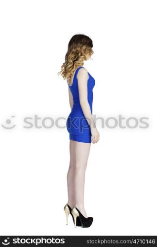 Sexy blond young woman in blue dress isolated on white
