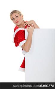 sexy blonde mother Christmas with board