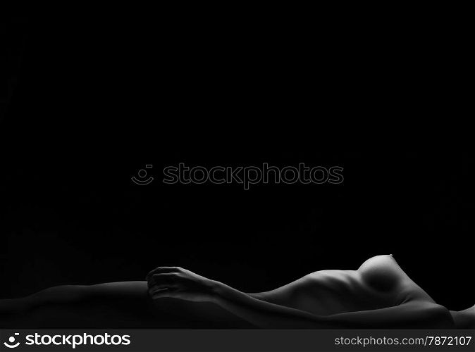 Sexy body nude woman. Naked sensual buttocks isolated on black