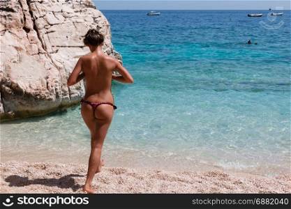 Sexy Caucasian Girl Topless at Beach near Sea