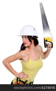 sexy craftswoman holding a handsaw