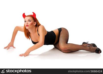 sexy devil in black lingerie and stockings with red horns