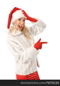 Sexy Girl dressed as Santa Claus Points Finger to Advertising Space