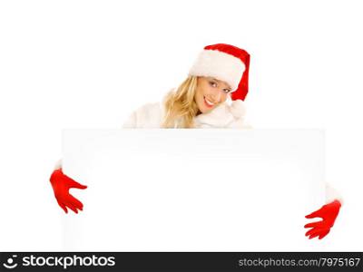 Sexy Girl dressed as Santa Claus Points Finger to Advertising Space