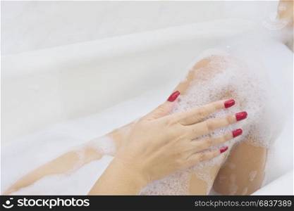 Sexy girl in white bathtub