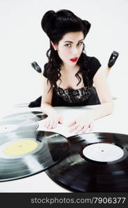 Sexy girl with phonography analogue record music lover studio shot