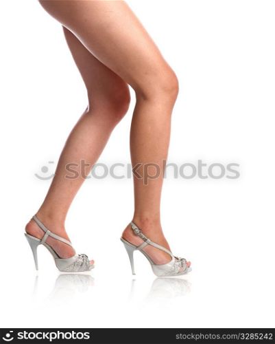 sexy legs of the girl in pink lingerie on hi h heels isolated on white