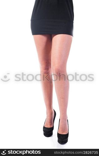 Sexy long female legs isolated over white background