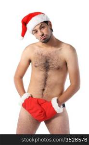 Sexy muscular man wearing a Santa Claus hat isolated on white