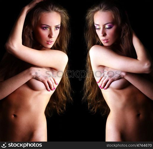 Sexy nude models in dark studio
