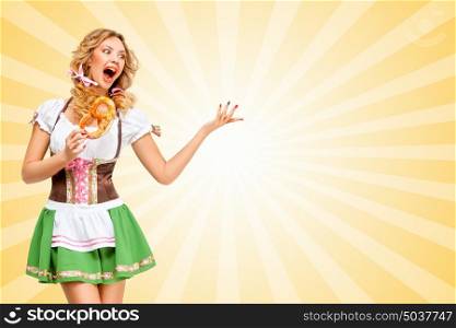 Sexy Oktoberfest woman wearing a traditional Bavarian dress dirndl dancing with a pretzel in hands on colorful abstract cartoon style background.