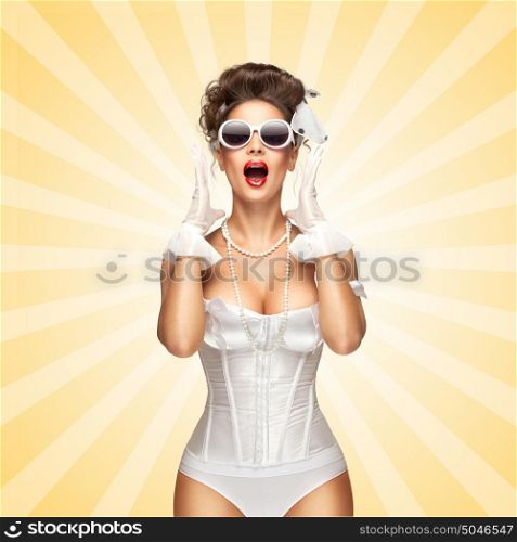 Sexy pinup bride in a vintage wedding corset grimacing and screaming on colorful abstract cartoon style background.