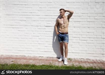 Sexy portrait of a very muscular shirtless male model
