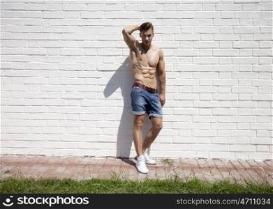 Sexy portrait of a very muscular shirtless male model