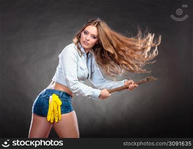 Sexy seductive woman holding axe chopper. Strong girl feminist working in man profession. Independent female. Studio shot.. Sexy strong woman feminist with axe working.