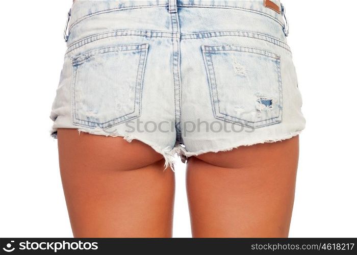 Sexy woman body in jean shorts isolated on a white background