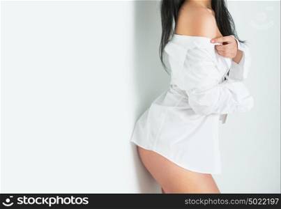 Sexy woman body. Part of body and copyspace. Undressing and alluring
