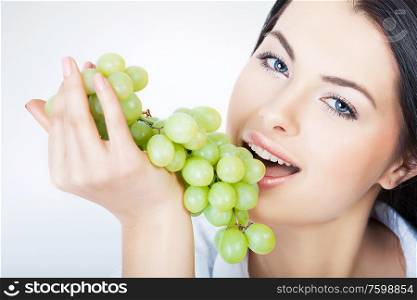 sexy woman eating grape