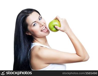 sexy woman eating green apple on white background