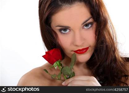 Sexy woman holding a rose