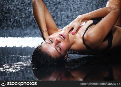 sexy woman in water studio