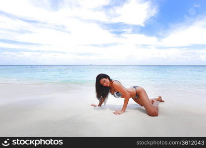 Sexy woman lying on the beach