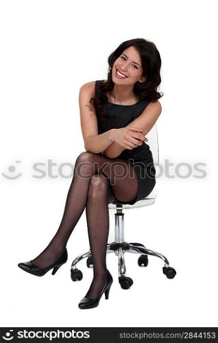 sexy woman sitting on a chair