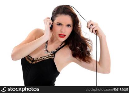 sexy woman with headset grimacing