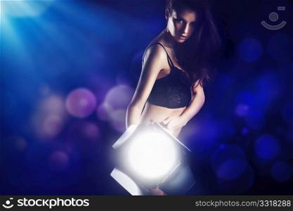 Sexy woman with lamp