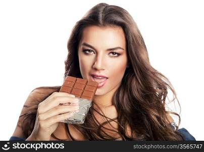 sexy woman with long hair and chocolate block on white background