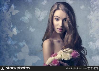 sexy woman with long natural hair posing with surprised expression, looking in camera and taking bouquet of roses in the hands