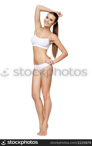 Sexy young girl in white lingerie on a white background. Sexy young girl in white lingerie