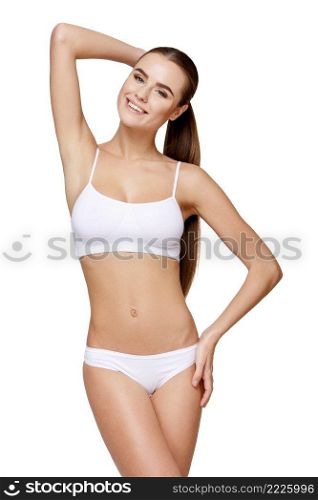 Sexy young girl in white lingerie on a white background. Sexy young girl in white lingerie
