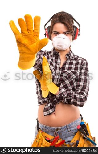 Sexy young woman construction worker making stop sign with her hand