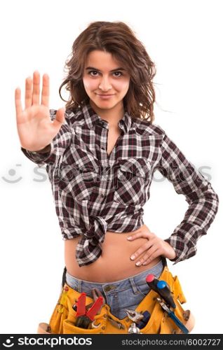 Sexy young woman construction worker making stop sign with her hand