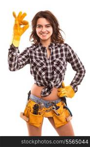 Sexy young woman construction worker signaling ok