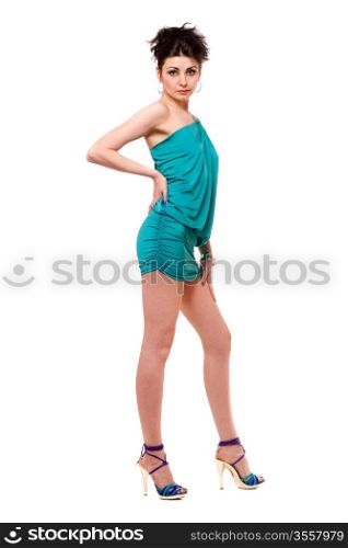 Sexy young woman in a blue dress. Isolated on white
