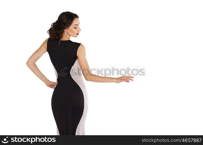Sexy young woman in long evening dress, isolated on white
