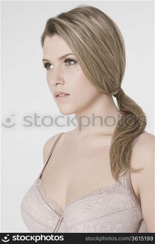 Sexy young woman wearing bra