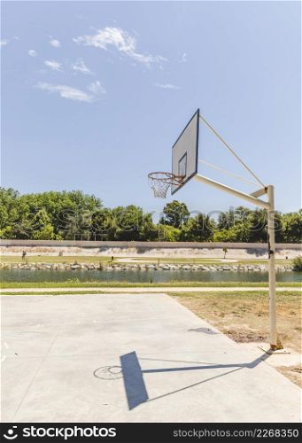 shadow empty basketball hoop outdoors court