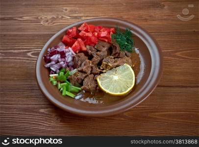 Shahan ful - simplified to ful, is a dish common in Eritrea, Ethiopia, Sudan and the region. served with chopped green onions, tomatoes,