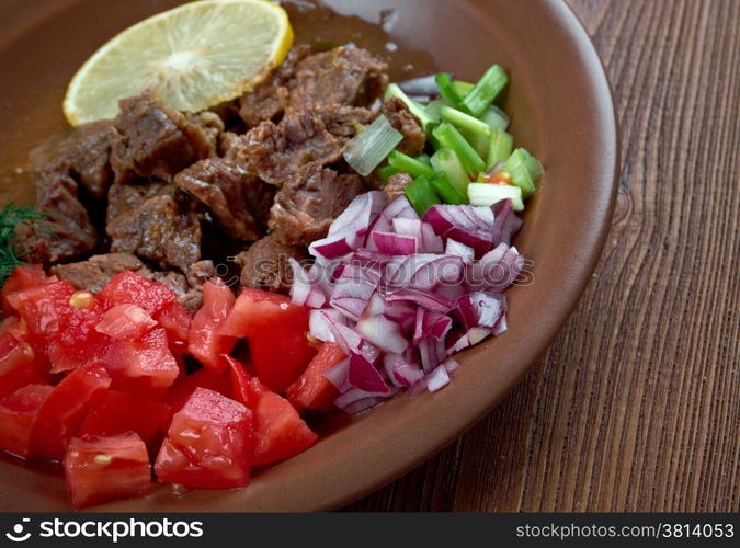 Shahan ful - simplified to ful, is a dish common in Eritrea, Ethiopia, Sudan and the region. served with chopped green onions, tomatoes,