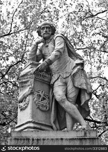Shakespeare statue. Statue of William Shakespeare (year 1874) in Leicester square, London, UK