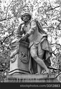 Shakespeare statue. Statue of William Shakespeare (year 1874) in Leicester square, London, UK