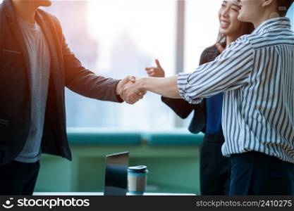 Shaking hands,successful business people shakes hands with partner,Concept of signing an agreement.