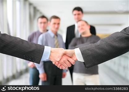 shaking hands with wrists and business team 2