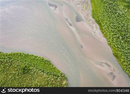 shallow and wide Dismal River at Nebraska National Forest, aerial view of summer scenery
