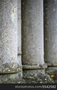 Shallow depth of field on receding stone pillars